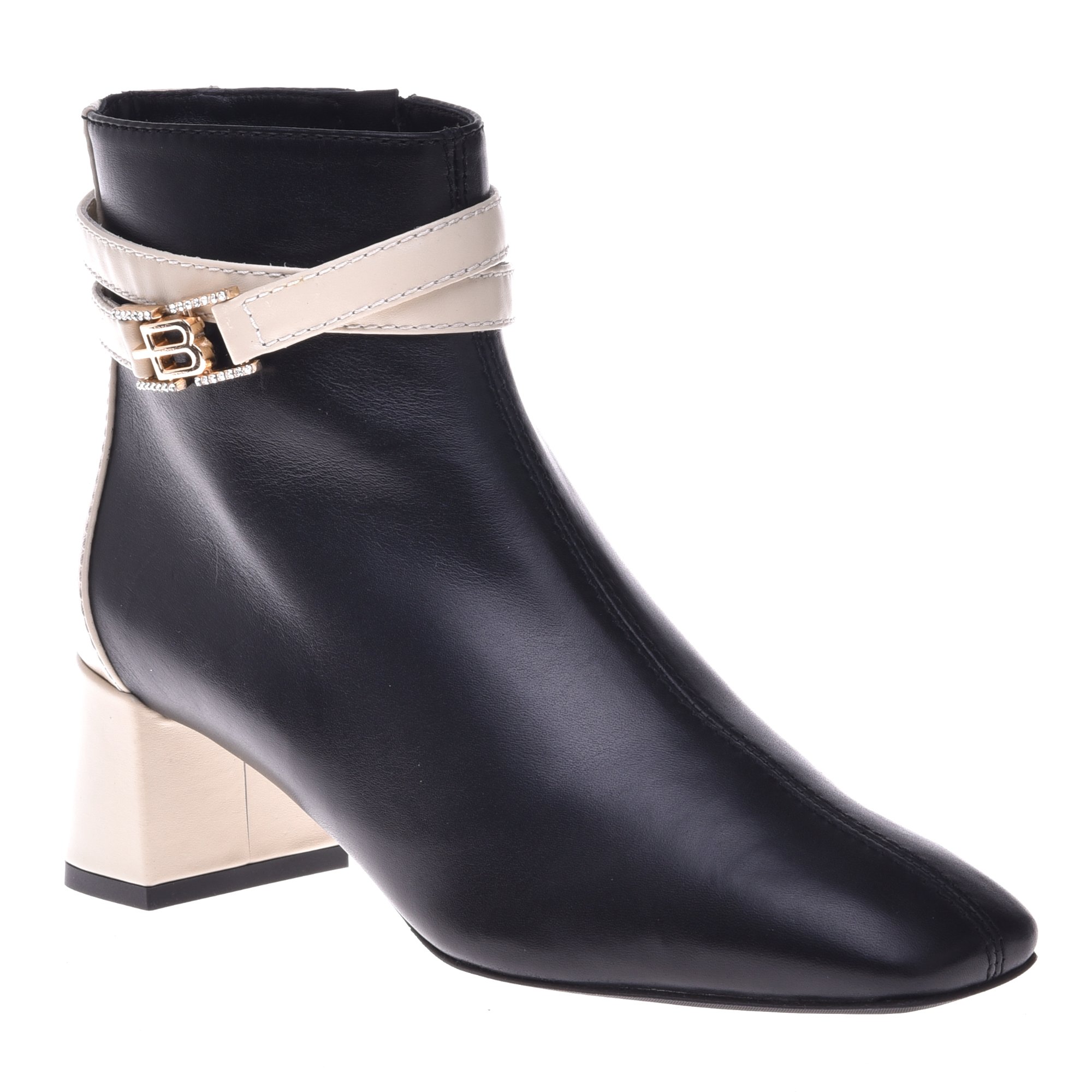 Ankle boots in vanilla and black leather image