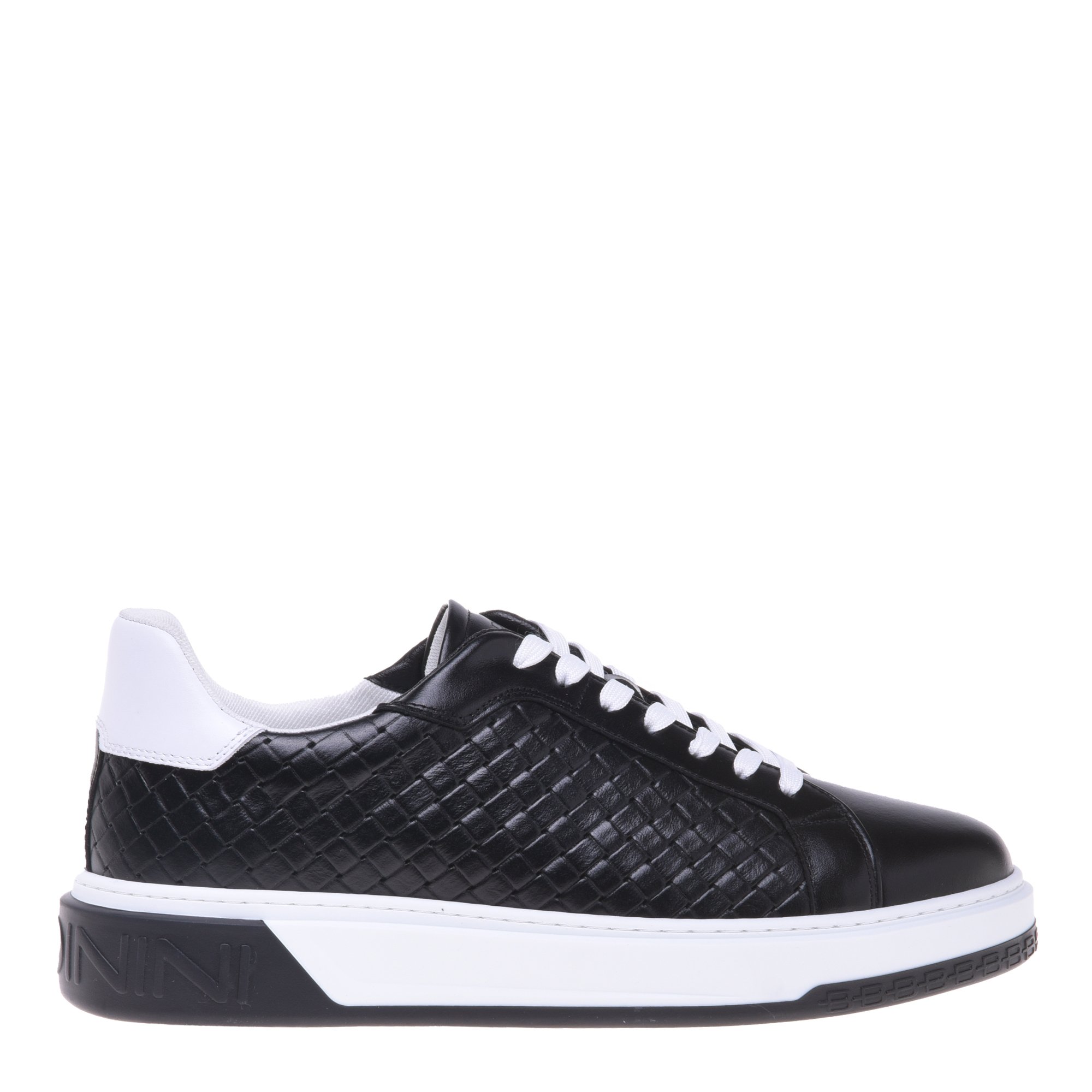 Trainer in black with woven print image