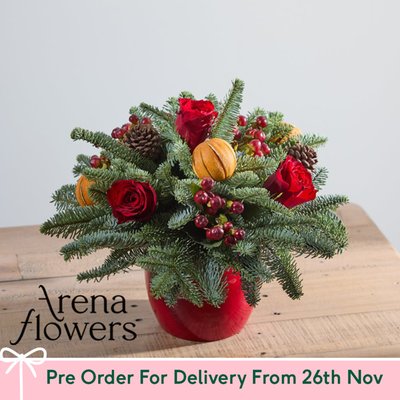 Christmas Table Arrangement by Arena Flowers