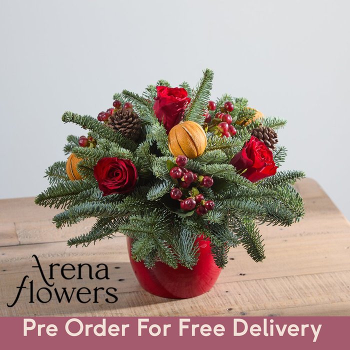 Christmas Table Arrangement by Arena Flowers