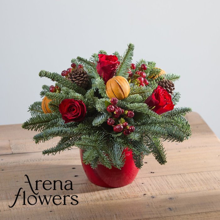 Christmas Table Arrangement by Arena Flowers