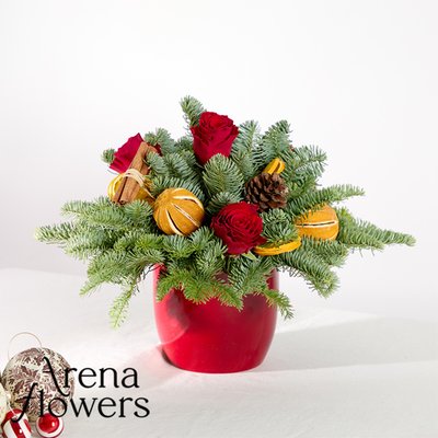Christmas Table Arrangement by Arena Flowers