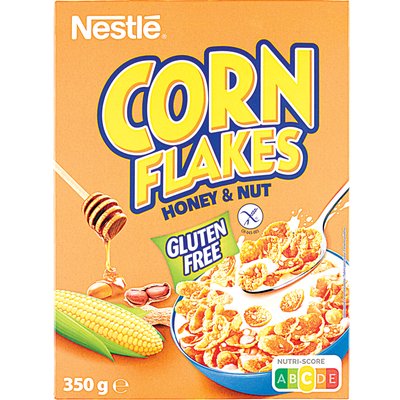 NESTLÉ CORN FLAKES KUKORICAPEHELY MÉZZEL ÉS FÖLDIMOGYORÓVAL termékképe