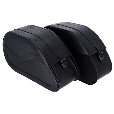 32 liter per bag. Dimensions per bag: 56cm long x 18cm wide x 32cm high. Manufactured from premium quality 2.8mm thick split leather. All saddlebags, side bags and sissy bar bags come with a 4mm thick HDPE (polyethylene thermoplastic) back panel, unless mentioned otherwise. This is same material of which, for instance, kayaks are made, to ensure maximum strength & shape retention under harsh conditions. The reinforcing plate is sewn onto the leather, giving it excellent strength and great universal mounting options. A special groove is cut into the HDPE back plate, allowing for lowered stitching in the groove, below the surface of the back plate. This protects stitching from abrasion. All bags are pre-treated with a special oil for maximum life and water resistance. All bags are hand-made by experienced personnel to ensure a continuous high quality standard.
Mounting note: These saddlebags can be used with the 559467 universal Ledrie saddlebag carrier set or with the 55946 Ledrie universal saddlebag support bracket. Since motorcycle specific application and rider preference differs no hardware is included and no provisions are made to mount the saddlebag to saddlebag carrier. Holes can be drilled in the reinforced rear section of the saddlebag, at the desired point and installed to the universal carrier frame, which must be ordered separately, or custom made. Many riders prefer a simple but effective installation to the carrier with some sturdy cable straps.
Mounting note: Model specific hardware kits are available as 559463 for 91-03 Sportster, 559464 for 04-13 Sportster, 559465 for 86-17 Softail; 96-17 Dyna (excl. FLD); 14-20 Sportster.
Note: 559457 turn signal relocation kit is available for 96-17 Dyna (excl. FLD Switchback models).
Note: Dimensions and capacity are approximate and for reference only.