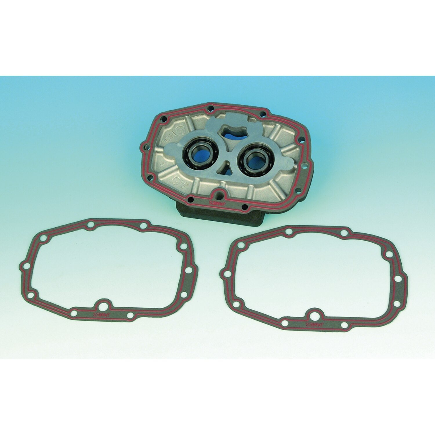James, transmission bearing housing gasket. Paper/silicone