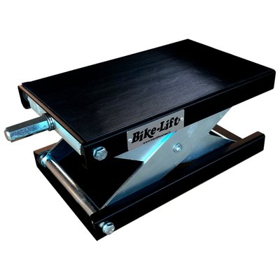 Black powder coated and zinc plated. Minimum height 8.5cm; Max. height 35cm; Max. lifting capacity 500kg; 25cm wide x 40cm long platform.
Small but very capable and a quality mini-lift is an absolute necessity in any professional workshop. With the Bike-Lift name on it you can be assured of high end quality of this versatile center lift.
Note: For bikes with a non-flat underside universal frame adapter set is available as 529212. Compatible with the 25cm wide center lift 529211 only.
Note 1: Use with a 24mm manual operated wrench only. Air or electric wrenches will damage the lifting threads permanently.
Note 2: Be safe. When using the center lift always secure the bike with tie-downs.