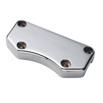 Smooth, billet aluminum with exposed mounting bolts. 
Works with stock style risers, with 3-1/2" distance between riser mount bolts and offset top clamp bolts, and all handlebars with 1" diameter clamping area.