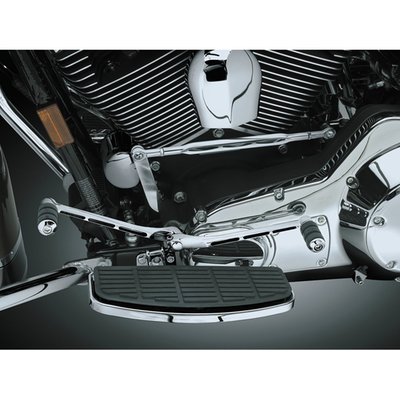 Chrome. Extra long, 8 inch, makes it about 1-3/4" longer and gives a lot more space than a stock Touring or FLST shift lever. Fits front (toe) & rear (heel).