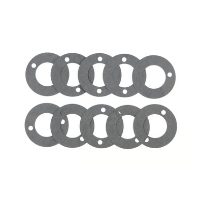 Fiber. OEM replacement reference 31488-77. 
Cometic's fiber gaskets are made from premium hi-temperature, hi-density creep resistant material that requires no re-torquing, no additional sealants, is fuel resistant and asbestos free.