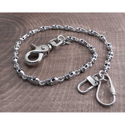 Silver; Pewter chain with antique silver plating; with thin, elongated skull heads; skulls measure 3/4"" length by 1/4" width; the sturdy snap hook and dual wallet hook end-pieces adds approximately 3" to the chain length