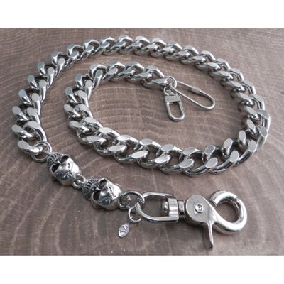 Silver; light weight chrome-plated aluminium chain, with two antique silver-plated 1" skulls; chain links 1" length by 3/4"; the sturdy snap hook and dual wallet hook end-pieces adds approximately 3" to the chain length