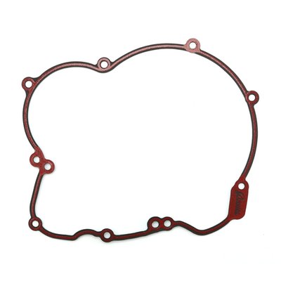 .031" thick Foamet with a silicone bead. Foamet gasket material has an aluminum core with a nitrile synthetic rubber foam layer bonded to both sides. 
OEM replacement reference 25700224.