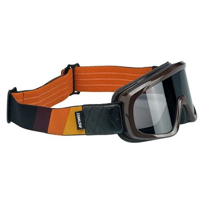 Biltwell's Overland 2.0 Goggles are premium motorcycle goggles for high-performance riding. Low-profile molded polyurethane frame features highly impact-resistant molded polycarbonate lens with anti-fog treatment for great protection and optical clarity. Woven elastic strap, features embossed synthetic leather mounts, with double D-rings and anti-slip silicone strips to create stiction against the helmet to reduce slipping. 3-Phase BioFoam eye port padding features quilted fleece Lycra touch points to wick sweat and filter out airborne dust. Meets CE EN1938:2010 standard for recreational motorcycle operation. Includes second clear replacement lens for safe riding in low-light conditions. Loads of colorways on this model because variety is the spice of life.