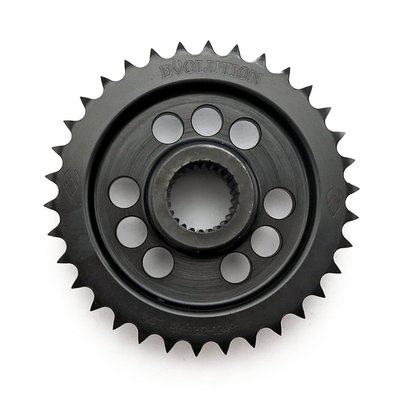 The stock compensator sprocket assembly includes a damper system which can induce slippage, noise and weighs 2.16kg (4.77 lbs.). This Evolution Industries motor sprocket is a rigid mounted sprocket to prevent any issues related to the stock sprocket and does so at less than half the weight. Manufactured from black oxide coated high strength 4140 tool steel.
Custom replacement for OEM 40100076, 40100076A compensator & motor sprocket assembly.