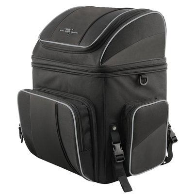The Route 1 Destination bag is the larger version of the Getaway bag for even more space.
- Industry leading UltraMax® fabric for maximum UV protection. 
- Mounts to luggage rack, sissy bar or seat using quick release and self-fastening straps. 
- Divided upper and lower storage compartments with lockable zippers. 
- Rigid construction an solid base panel prevents sagging. 
- Zippered panel in top section converts bag to one massive compartment. 
- Front pocket folds down to provide easy access to main compartment. 
- Additional 3" (7.6cm) expansion section and 3 generous outer pockets. 
- Carrying handle for off-bike transport. 
- Reflective piping enhances visibility; waterproof rain cover included. 
- Main compartment: 35.5 liter. 15" (38cm) L x 12" (30.5cm) W x 12" (30.5cm) H. 
- Top compartment: 18 liter. 15" (38cm) L x 12" (30.5cm) W x 6" (15.2cm) H.