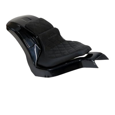 Unpainted gloss black finished ABS. Perfect for installing a wider, up to 280 series, rear tire. Comes with a steel inner fender carrier, a sturdy 5-axis CNC machined ABS outer fender and a genuine leather seat. After the stock fender is removed the Racing steel fender is simply installed on the stock mounting points. Then wiring is installed and ABS outer fender is bolted to the inner fender. Permanent mods are not required. Complete with LED taillight, LED turn signals, seat and hardware. This comes with approval. 
Parts include: 
- ABS plastic rear fender 
- Metal inner fender 
- Wiring harness including lighting for "plug and play" connection 
- Genuine leather seat and pillion pad (depending on selection) 
- Mounting material 
- 2x spring travel limiters. 
Note: Image shows a 280 series tire on a widened rim. 
Note: A load equalizer may be required to correct turn signal flashing speed.
Note: Check your local MCS dealer or the MCS sales department for exact type of approval and validity on bike model and years on the test report.