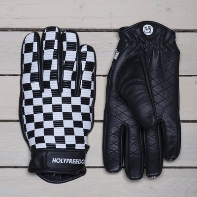 The Holy Freedom Sir Cock glove is a nice cafe racer style glove with padded comfort liner, perforation for cooling and velcro closure strap. It is made from full grain leather with internal contoured reinforcements for knuckles and fingers. The glove has a CE EN13594 homologation. This is a specialised standard for assessing the level of protection provided by a glove during a potential accident while motorcycle riding.