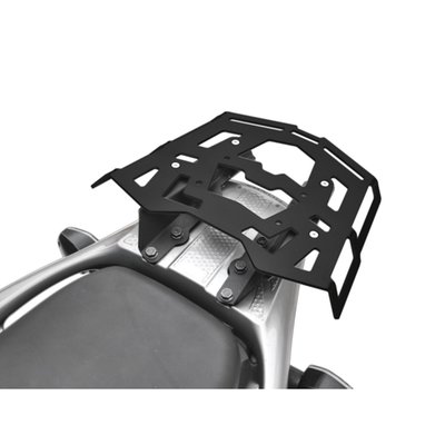 This black powdercoated luggage rack is made from 4mm thick and laser cut aluminum. It can be mounted to the original support plate to enlarge the rack's surface area. The slots for the fastening straps secure the luggage directly on the luggage rack. 