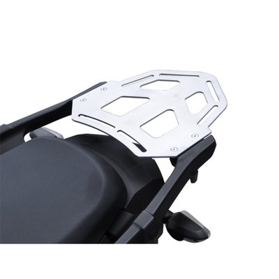 This silver powdercoated luggage rack is made from 4mm thick and laser cut aluminum. It can be mounted to the original support plate to enlarge the rack's surface area. The slots for the fastening straps secure the luggage directly on the luggage rack. 