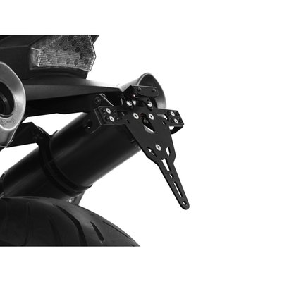 Black powder coated license plate bracket that allows installation without making changes to the fairing parts. Use with 175mm wide license plate (Germany, France, Italy). Including LED license plate light (ECE approved)