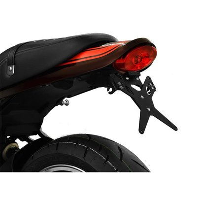 Black powder coated license plate bracket that allows installation without making changes to the fairing parts. Use with 175mm wide license plate (Germany, France, Italy). Including LED license plate light (ECE approved)