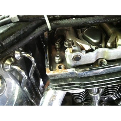 Twin Cam engines make a lot of noise inside the rocker cover. This is due to the way H-D designed the rocker arm installation. The bolt that locks the rocker shaft is not a tight fit at all, when installed it allows the rocker shaft to rotate slightly forward and backwards in the housing. There it hits the rocker shaft bolt, which provides you with the unnecessary clicking sound. This kit comes with 4 precision tapered bushings that fit around the rocker shaft bolts when it is installed, which eliminates rocker shaft movement. It does not interfere with the working of the rocker arm. The kit includes a washer and nut for installation and the required tool for aligning the rocker arm shaft correctly, before the bushing is installed. An experienced mechanic should be able to get the bike back on the road in around 3 hours. 

Note: When the rocker shafts require removal a new Rocker Locker kit will be required.