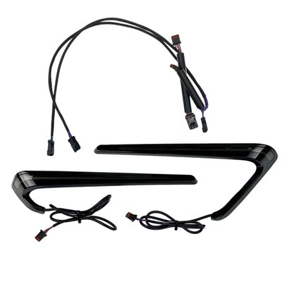 Gloss black with a smoke lens. 
Comes with a sleek, tapered shaped body with a single row of dual intensity red LEDs, for both left & right saddlebag. Lights wrap closely around the rear facing edge of the saddlebag for increased visibility, especially from the side. Units are pre-taped for easy mounting and equipped with connectors for a plug and play installation under the seat with the provided wire harnesses.