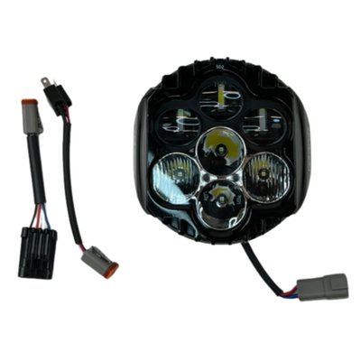 Plug & Play ECE, DOT-compliant performance LED headlamp. 
The Shark Demon® 2 FLH Batwing Headlight Kit offers high-performance illumination, specialized for motorcycle on road use. ECE, DOT compliant design with unmatched beam pattern and durability. Low beam projects 3600 raw/2651 effective lumens from three projection-style LEDs. High beam adds four additional direct-reflective LEDs boasting an impressive 9080 raw/4485 effective lumens total. Single lamp assembly is completely sealed IP67, waterproof with clear polycarbonate lens and gloss black aluminum housing. 3mm, 304 gloss black stainless steel mounting bracket offers OEM style headlight adjustability for proper aiming. 
Includes Plug and Play wire harness and mounting hardware for direct OEM replacement installation. 