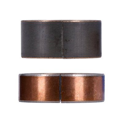 Replacement for 46516-01 upper and 46080-01 lower fork slider bushing.
Dimensions: Upper bushing 52x15x1.5mm, lower bushing 50x20x1mm.
Kit includes 1 upper and 1 lower fork slider bushing.
Enough to service one fork leg.
Order 2 kits for one motorcycle.
Used inside the lower fork slider to guide the fork tube. Bushings are plated steel, the PTFE coated inner lining reduces friction / fork-stiction over other materials. This super slick surface provides smooth suspension and helps reduce friction and wear.
Used inside the lower fork slider to guide the fork tube. The SKF composite bushings are copper plated stainless steel, with a PTFE based inner lining to help reduces friction / fork-stiction better than other materials. To enhance heat dissipation during operation, a thin bronze layer forms a robust bond between the backing and sliding surface. The super slick sliding surface provides smooth suspension and does a great job in reducing friction and wear.
- PTFE based low friction seal
- Low stiction
- No maintenance
- Low friction under side load
- High load carrying capacity
- Temperature stable
- Small operating clearance for improved guidance
- Dimensions marked for quick identification