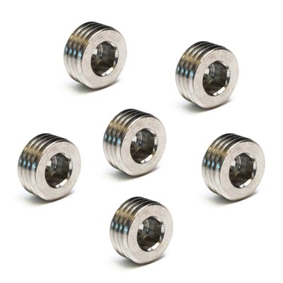 Oil drain plug / block-off plug. 1/4" NPT threaded. 
Shorter version of the OEM 765 crankcase / sump drain plug. The Feuling plug is just 0.265" tall vs. OEM 0.465". The further the bottom plug installs into the crankcase, the more of the scavenge cross port is blocked off. For optimum oil scavenging & lower sump levels, it is advisable to use the shorter sump plug which will ensure the cross sump port is wide open and allows the oil pump to pull as much as possible from the sump. 

Eliminate blocking the internal engine case scavenge pick up hole with the FEULING bottom case Short Sump Plug. A common issue with both Twin Cam and M8 engines (more common with Milwaukee Eights) is the sump plug can block off the internal scavenge (return) pick up port. By using a shorter plug, we eliminate the possibility of the plug blocking off this cross port. 

Note: The M8 main sump cross port on the inside of the M8 engine case is in a slightly different location & height in each engine case. This cross port is created when the bottom plug hole is machined and tapped by the factory. The machining breaks through the casting wall, creating the sump port. Whereas the Twin Cam engine cross scavenge pick up hole is a machined bore, and is in the same location in every engine case.


