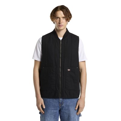 The Dickies Quilted canvas vest is a relaxed fit zip-up vest. Made out of 12OZ cotton canvas with quilted taffeta lining, this durable and stylish workwear vest with comfort wash features low pockets with metal trims and rivets, bomber collar, armhole binding, faux down padding, full metal zip, and woven Dickies label. A warm and rugged vest ready for work or adventure.