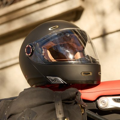 The By City 90 Degrees helmet is the ultimate modular helmet for taking it all on the road in the most stylish way possible. Crafted with a lightweight fiberglass shell and multi-density padding, it ensures optimal protection and comfort for riders. The injected visor provides clear visibility, while ventilation inlets maintain airflow during rides. Its removable and washable interior ensures hygiene and longevity. Equipped with a micrometric closure for secure fastening, the helmet is also Bluetooth-ready, catering to modern connectivity needs. Certified under the latest ECE/UN R22.06 standards, the 90 Degrees helmet offers riders a perfect blend of style and safety.

• Modular fiberglass helmet
• Multi density padding
• Visor injected
• Ventilation inlets
• PJ locking system
• Micrometric closure
• Removable and washable interior
• Screen prepared for anti fogging screen
• Antifogging film included
• Deflector
• Bluetooth ready
• Weight: 1500 ± 50gr
• Certification ECE/UN R 22 06