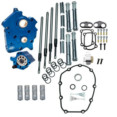 With chrome pushrod tubes. 
Complete chain drive cam chest kit without cams, to give you a solid base for a performance engine. 
In this kit you'll find an upgraded cam plate, oil pump, tappets, cuffs, and pushrods. This cam chest kit is compatible with any performance cam out there you fancy (or already have). 
Oil Pump/ Cam plate: 
- Plate Precision machined from billet aluminum 
- Passage plugs removable for servicing 
- Independent scavenge sections for flywheel cavity and cam chest 
- Debris screens in both scavenge pickups 
- Magnet in cam chest side to help to stop debris from entering oil pump 
- 44% flow increase on supply side and 58% flow increase on scavenge 
- Pressure relief valve is adjustable with unit installed in engine 
- Includes S&S High Performance cam chain tensioner (907796). 
Pushrods: 
- Quickee pushrod kit, installs without removing rocker covers
- 7/16 anti-flex chrome moly tubing. 
Tappets: 
- S&S Precision Tappets 
- Hand assembled to exacting tolerances 
- Reduced valvetrain noise from start up to shut down 
- Close tolerances for low leak down rates 
- Fast pump up and superior high rpm performance. 
Tappet Cuffs: 
- Hard anodized black coating 
- Billet aluminum construction 
- Stronger than stock material eliminates distortion Improve tappet stability in high lift and high RPM situations 