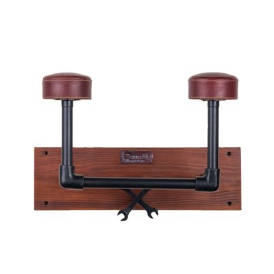 Every helmet needs its space so place it on the wall with this helmet hanger of Trip Machine. Keep all your riding gear organized and out of the way great way to store your helmet, gloves, jacket, and keys. Mounts easily on the wall using 2 screws provided in the box. Thoughtfully designed by giving enough space between the back of the helmet and the wood base immaculately handcrafted from antique finished wood, matt black iron, and premium leather. A classy addition to a garage, man cave or the hallway.