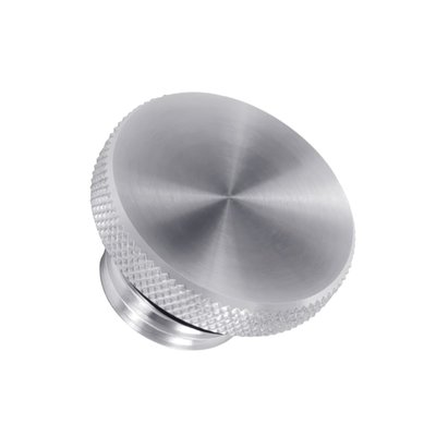 Clear 6061-T6 Aluminum fuel cap. 
Vented. 
Right hand threaded. 
Knurled for extra grip, for easy on-off with or without gloves. The lower threaded part of the cap has a spring-bound valve system, centrally located in the middle of the bung. This connects to 3 vents in the top part of the cap to allow alleviation of any pressure or vacuum that may build up inside the tank. The O-ring seal, that sits on the top of the thread, offers a secure seal.

