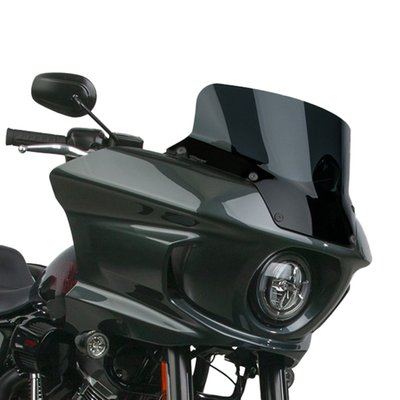 Mount kit included. Dark gray, 95% tint. Height: 29.21cm. Width: 43.18cm.
Made of 3mm thick Lexan® polycarbonate with National Cycle's state-of-the-art Quantum+™ Rain Repellent Hard Coating.
National Cycle VStream® replacement windscreens have a unique patented shape. The 'V' profile and dimensional contours push the wind vortex out and away from the rider's helmet, resulting in a peaceful, quieter riding environment. Manufactured from 3mm thick Lexan® polycarbonate with National Cycle's state-of-the-art Quantum+™ Rain Repellent Hard Coating. This is a new generation of polycarbonate hard coating that actually exceeds the hardness and scratch resistance of glass. The surface tension created by the water repellent coating results in water droplets that literally fly off the surface of the windshield at the slightest of angles or wind speeds. It all just got better than ever! Fits as a direct bolt-on High Quality replacement for the OEM style screen. Complete with mount kit.
Note: Center screen height is from the bottom center edge to top of screen.