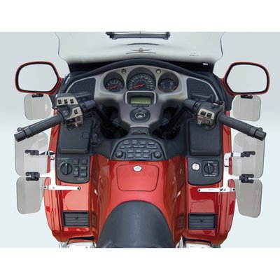 This FRM hardcoated Lexan polycarbonate mirror mount Wing Deflector, medium 50% tinted, allows maximum temperature control of airflow toward or away from the rider. National Cycle's unique Swivel Ratchets allow the Deflector to be incrementally adjusted by hand for personalized temperature control. 
There are no tools required for mounting (mount kit is included), installation is easy. This wing deflector is fully road worthy and, once adjusted, stays in place even at highway speeds. A unique one-piece steel bracket is designed for maximum strength and chrome plated for a beautiful finish.
There are no joints in National Cycle's brackets, so they can not move out of adjustment. The kit consists of 2 pieces.
