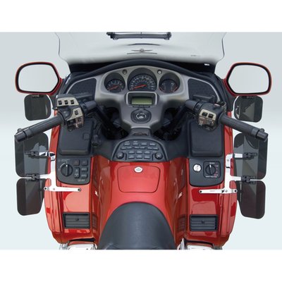 This FRM hardcoated Lexan polycarbonate mirror mount Wing Deflector, dark 95% tinted, allows maximum temperature control of airflow toward or away from the rider. National Cycle's unique Swivel Ratchets allow the Deflector to be incrementally adjusted by hand for personalized temperature control. 
There are no tools required for mounting (mount kit is included), installation is easy. This wing deflector is fully road worthy and, once adjusted, stays in place even at highway speeds. A unique one-piece steel bracket is designed for maximum strength and chrome plated for a beautiful finish.
There are no joints in National Cycle's brackets, so they can not move out of adjustment. The kit consists of 2 pieces.
