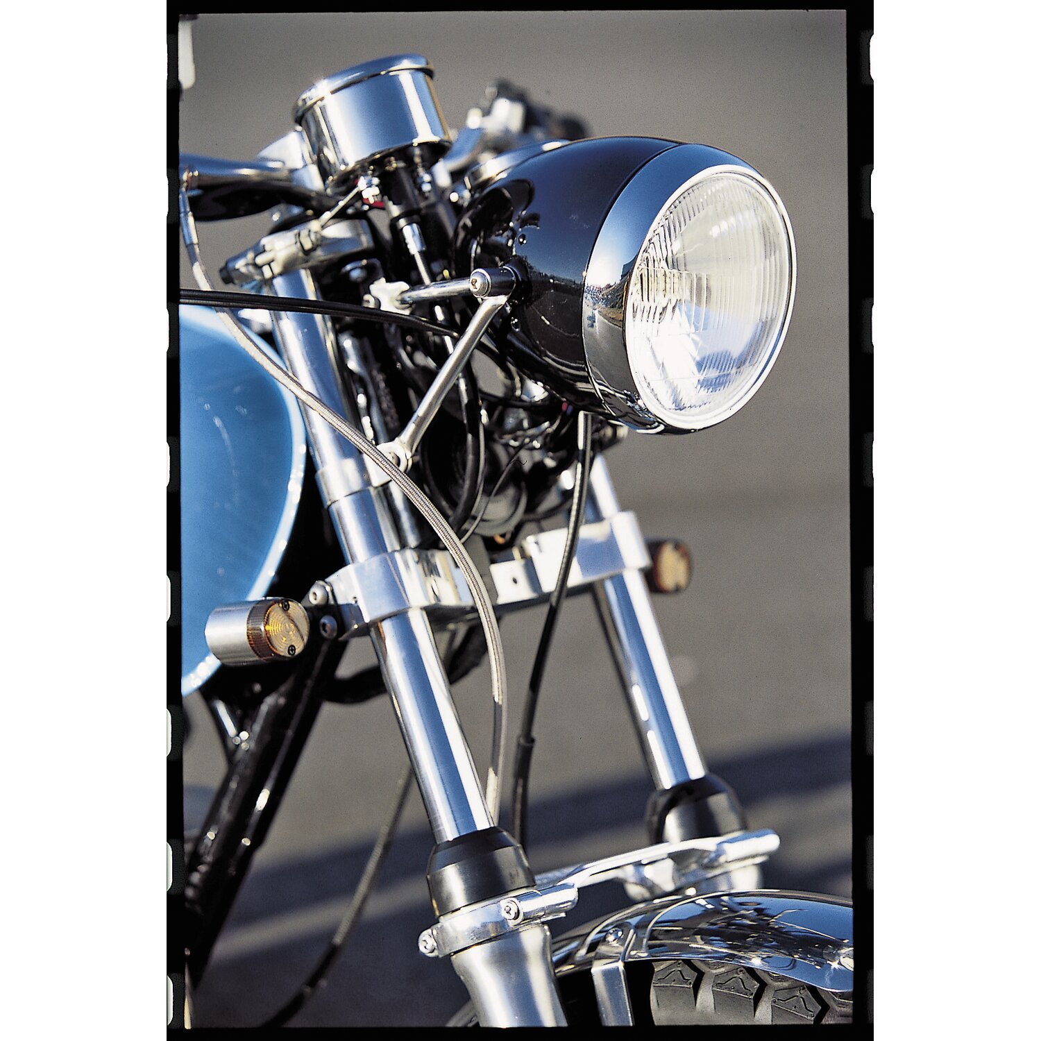 Daytona, Vintage 5-3/4" headlamp. Black with chrome ring
