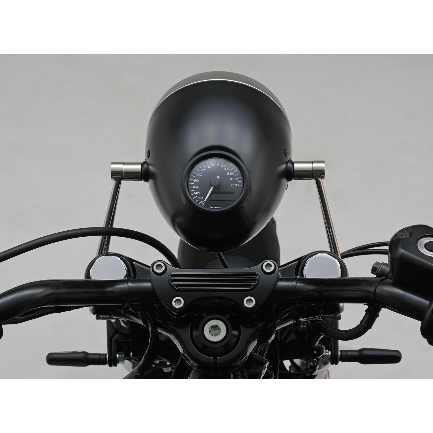 Daytona, Vintage 5-3/4" headlamp. Black with chrome ring