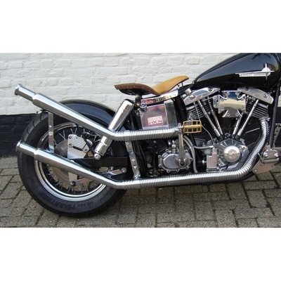 Chrome. 1 3/4" head pipes. If desired mufflers can be mounted. Rear pipe wraps close around the oil tank and becomes upswept. Rigid frame. Kick & E-start with wrap-around oil tank. Not compatible with mechanical brakes. Rear heatshield 903398.