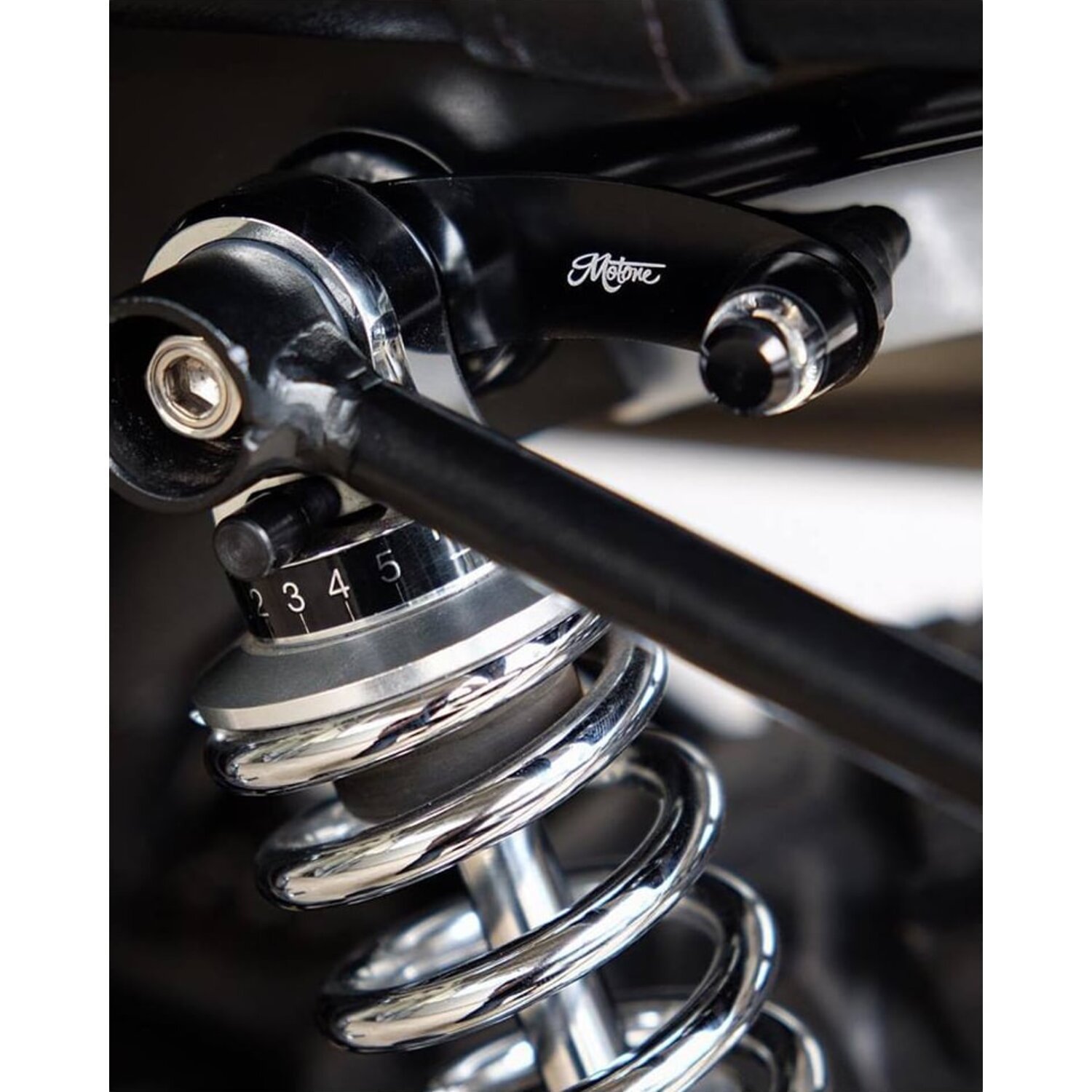 Motone, turn signal brackets, top shock mount