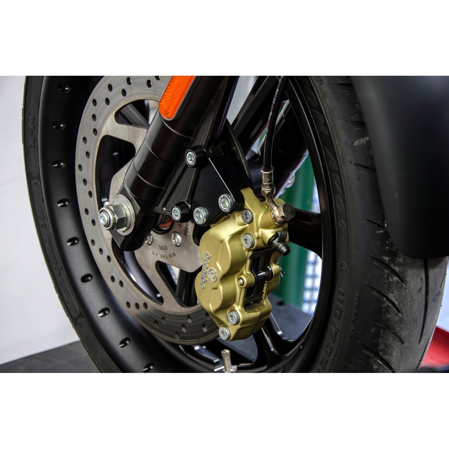 Free Spirits front caliper & bracket, Gold, Polished