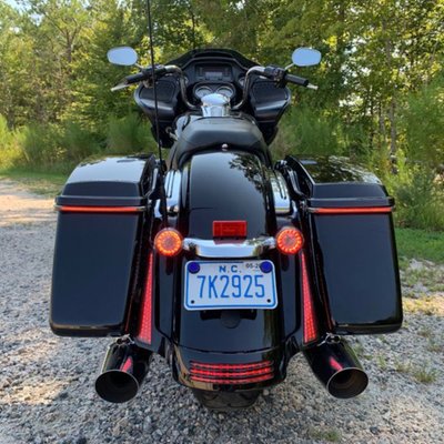 With gloss black trimand a smoke lens. Plug & Play. Saddlebag filler panel light set that simply installs with double sided adhesive tape between fender and saddlebags. Offers run-brake-turn function with 45 super bright dual intensity red LEDs that are waterproof sealed behind a lens.