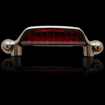 Adds an additional running and brake light as one row of 24 super bright 5mm LEDs, which are weatherproof sealed behind a lens. The unit is installed with the included mounting hardware to the underside of the luggage rack or sissy bar placing this light bar right at eye level to the traffic behind you. 
- 6 dual intensity red LEDS 
- Run & Brake 
- Includes mounting hardware 
- Simple 3 wire installation with provided Posi-Tap™ connectors 
- For models with H-D™ air foil luggage rack and air wing sissy bar upright 