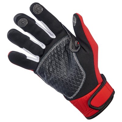 The '80s were the Golden Age of American motocross, when advances in gear design and material technology moved even faster than the legends who wore the stuff. That era and those riders were the inspiration for these Biltwell Baja gloves.
- Goat leather palm and thumb reinforcement for added toughness in these high friction areas.
- Synthetic suede palm and thumb construction for a snug, comfortable fit.
- Stretch polyester construction on ring and pinkie fingers for maximum flexibility.
- Three-ply woven mesh back panel for ventilation for comfort.
- Conductive stitching in fingers and thumb lets you operate smart screens.
- Molded two-ply neoprene wrist wrap with adjustable Velcro closure.
- Lycra expansion panels in finger joints for added dexterity.
- Rugged single- and double-needle polyester stitching throughout.
- Thermoplastic rubber lightning bolt knuckle protector.
- Hidden 5mm thick neoprene knuckle guard.
- Goat leather fingertips for extra durability.
- CE certified for recreational highway and off-road riding.