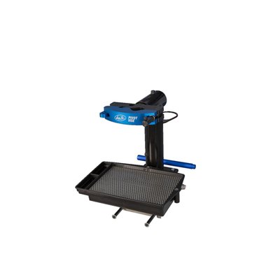 This is a front fork & rear shock absorber maintenance tool. It is used to securely hold the front fork slider for maintenance like oil & seal change. It also will hold the rear shock absorber, on body, shaft or shock reservoir, for maintenance work like spring, piston rod, seal head removal etc. 
- Designed to make suspension service simple and quick. 
- Holds shocks and forks securely while you change oil, re-valve, or change seals. 
- Pivoting head holds parts in any position, with mechanical stops every 45 degrees. 
- Aluminum Soft Jaw Vise holds cylindrically shaped parts utilizing a 4 point grip system. 
- Large side holds 40 mm to 61 mm diameter parts. 
- Small side holds 16 mm to 34 mm diameter parts. 
- Steel Frame is rigid yet has a small footprint, with 4 pre-drilled holes in the base for secure mounting to a workbench. 
- Movable fluid catch pan with mesh insert, and threaded drain bung. 
- HOW IT WORKS ON FORKS -
- Soft Jaw Fork Peg holds fork slider up for removal of dust seal and seal retaining clip. 
- Repositionable bottom slide bar holds forks compressed while bleeding air (priming cartridge) during reassembly and is an excellent platform for adding, adjusting and taking fork oil level measurements. 
- Can be used to assist in removing compression valve assembly (use of stock front axle required). 
- HOW IT WORKS ON REAR SHOCK ABSORBERS - 
- Holds shock firmly around shock body, shaft or shock reservoir. 
- Facilitates removal of piston rod and seal head. 
- Facilitates removal of shock reservoir caps, chamber pistons or bladder. 
- Holds shock to remove spherical bearings or needle bearings. 
- Holds shocks for removal of shock spring.