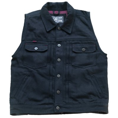 The 13 1/2 Rain-Splitter denim vest isn’t waterproof as the name might suggest, but is named after Luuk’s Rain-Splitter chopper which was featured in 13 and a Half Magazine #12.This vest is made of 14 oz. Tennessee denim, and the Rain-Splitter chopper is printed on the lining. There’s a zipper and push buttons on the front and zippers on the side pockets and inner pocket. Also available in denim. Look no further: this is your new favorite denim vest!