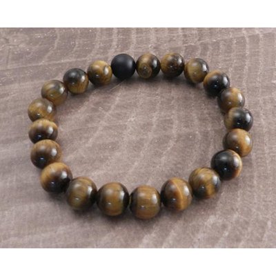 The Tiger Eye stone 10mm beaded stretch bracelet of Amigaz is made from 21 natural gemstone beads. This polished bead bracelet is made with 20 Tiger Eye beads and finished with a matte black onyx bead. Strung on stretch cord for easy on and off. It has been written that Tiger's Eye may also bring good luck to the wearer.
