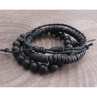 This 3 pack set of black bracelets of Amigaz features 3 styles. The set has 1 pc. 8mm round coco wood beads, 1 pc. 8 x 2&3 mm coco wood disc beads and is nicely complimented by 1 pc. Braided 3mm cord bracelets. This is a generous grouping of bracelets filled with 2 stretch cord bracelets and 1 black cord bracelets that have a disc and loop clasp.